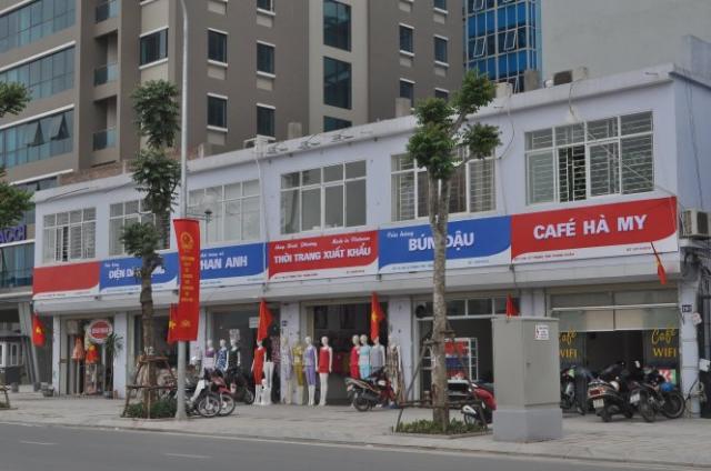 Phố kiểu mẫu đồng phục xanh đỏ làm khó dân - 0