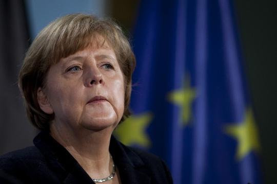 Bà Merkel chi gần 90 triệu euro để người di cư hồi hương - 0