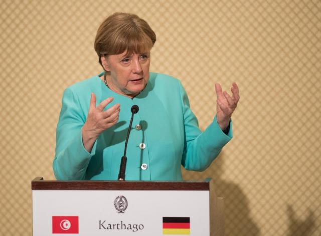 Thủ tướng Đức Merkel đến Tunisia giải quyết vấn đề di cư - 0