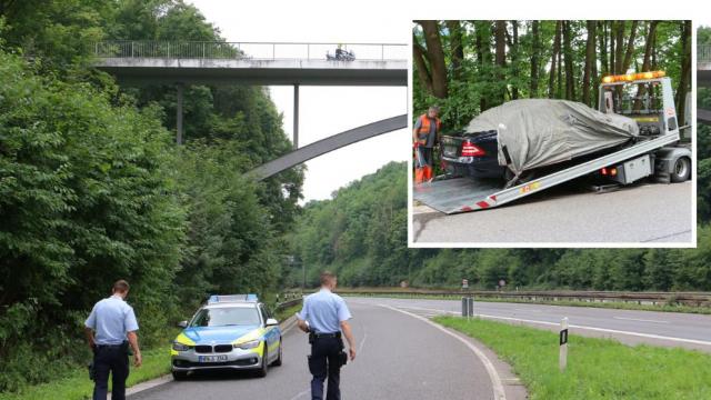 Đức: Cụ ông đang lái xe chết thảm khi bị người tự tử rơi trúng đầu - 0