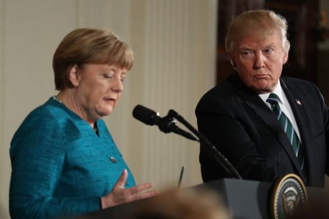 Thủ tướng Angela Merkel kêu gọi tôn trọng Tổng thống Donald Trump - 0