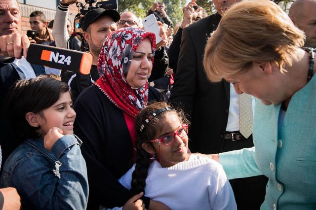 Thủ tướng Đức không hối tiếc khi nhận hàng triệu người tị nạn - 0