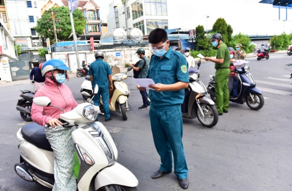 1 Hoi   Dap Ve Dich Covid 19 Tu Quan Nay Sang Quan Khac O Tphcm Co Can Giay Xet Nghiem Am Tinh