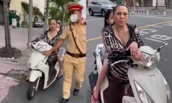 1 Nguoi Phu Nu Khong Deo Khau Trang Ly Su Voi Canh Sat Giao Thong