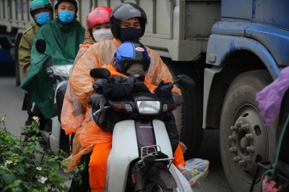 1 Nguoi Dan Doi Mua Roi Ha Noi Ve Que An Tet