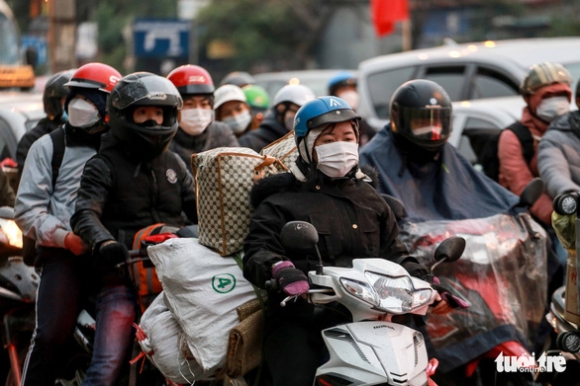 3 Nguoi Dan Doi Mua Ret Tro Lai Thu Do Chieu Mung 5 Tet