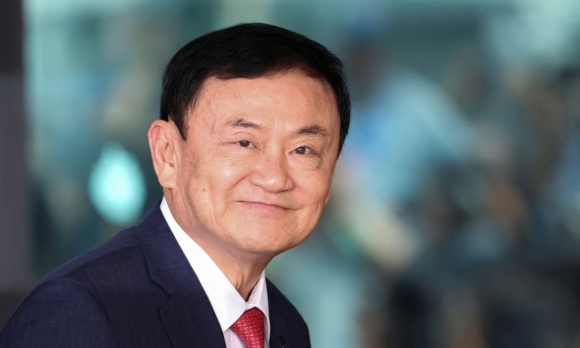 1 Ong Thaksin Muon Xin An Xa Them
