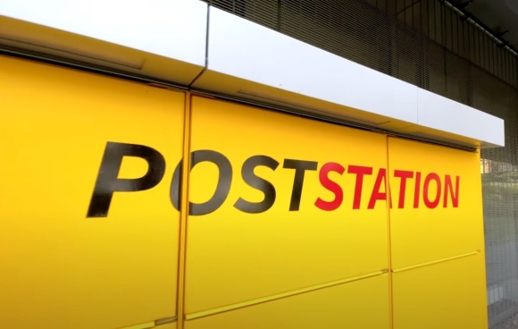 1 Buu Dien Duc Doi Moi Voi May Tu Dong Thay The Quay Giao Dich Truyen Thong