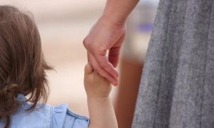 Có được nhận con nuôi nếu đã có con ruột?