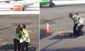 Trễ chuyến, người phụ nữ vượt hàng rào an ninh, chạy đuổi theo máy bay trên...