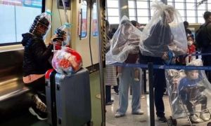 Người Trung Quốc trùm túi nilon, đội chai nhựa tránh virus corona