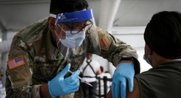 Ông Biden ưu tiên dân Mỹ, nói 'có dư mới chia sẻ vắc xin' với thế giới