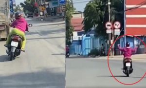 Nữ tài xế lạng lách, đánh võng, buông hai tay giữa làn xe ô tô ở Bình Dương