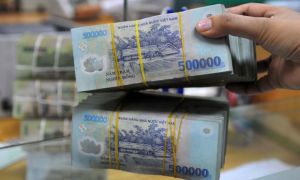 Ngân hàng Nhà nước bơm ròng 74.000 tỷ đồng, lãi suất qua đêm lên 7%/năm