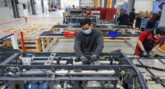 Kinh tế Đức tăng trưởng cao hơn dự báo bất chấp khó khăn
